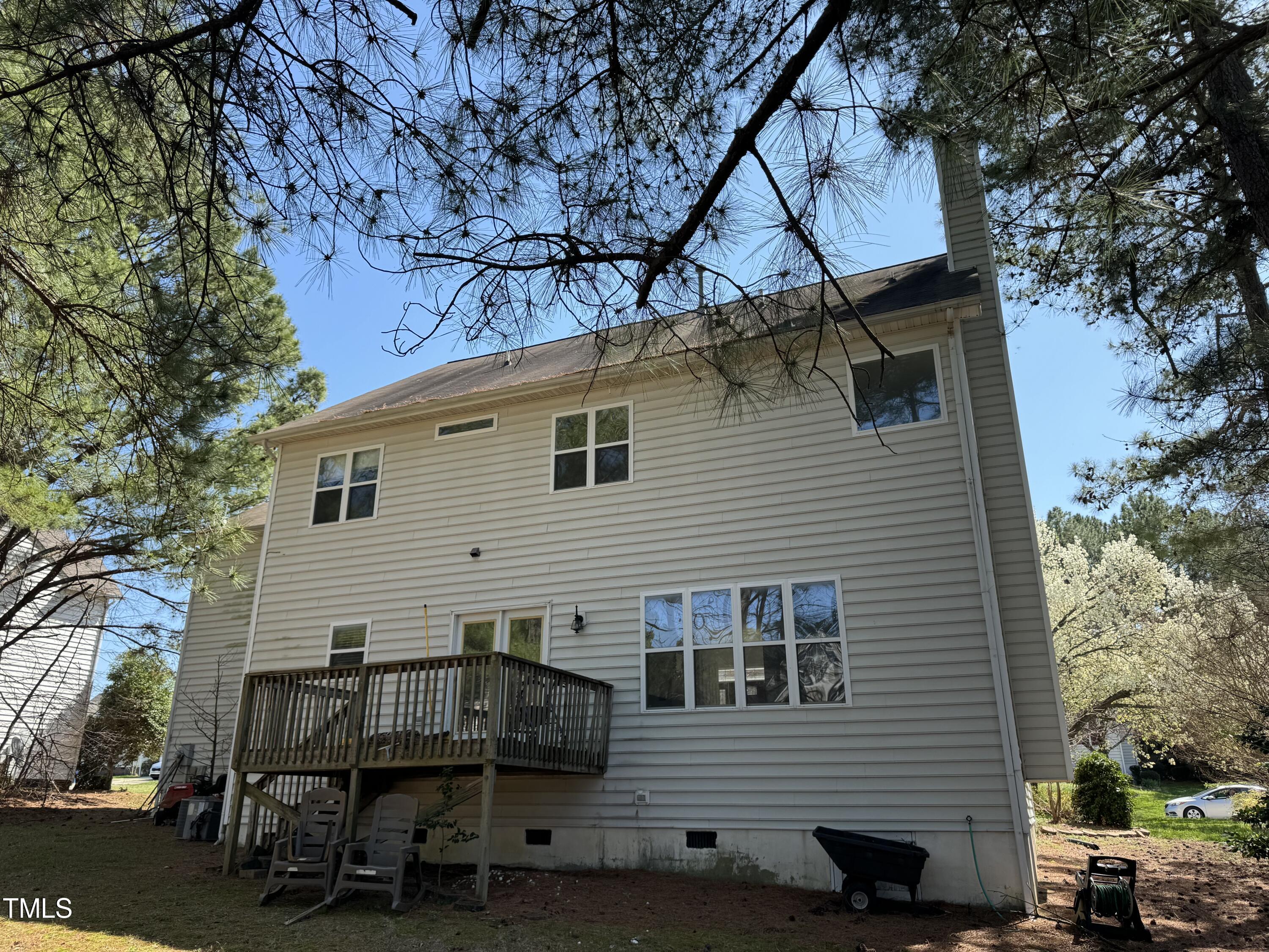 4809 Arbor Chase Drive Raleigh, NC 27616 - Photo 5 of 10 a view of a house with a patio