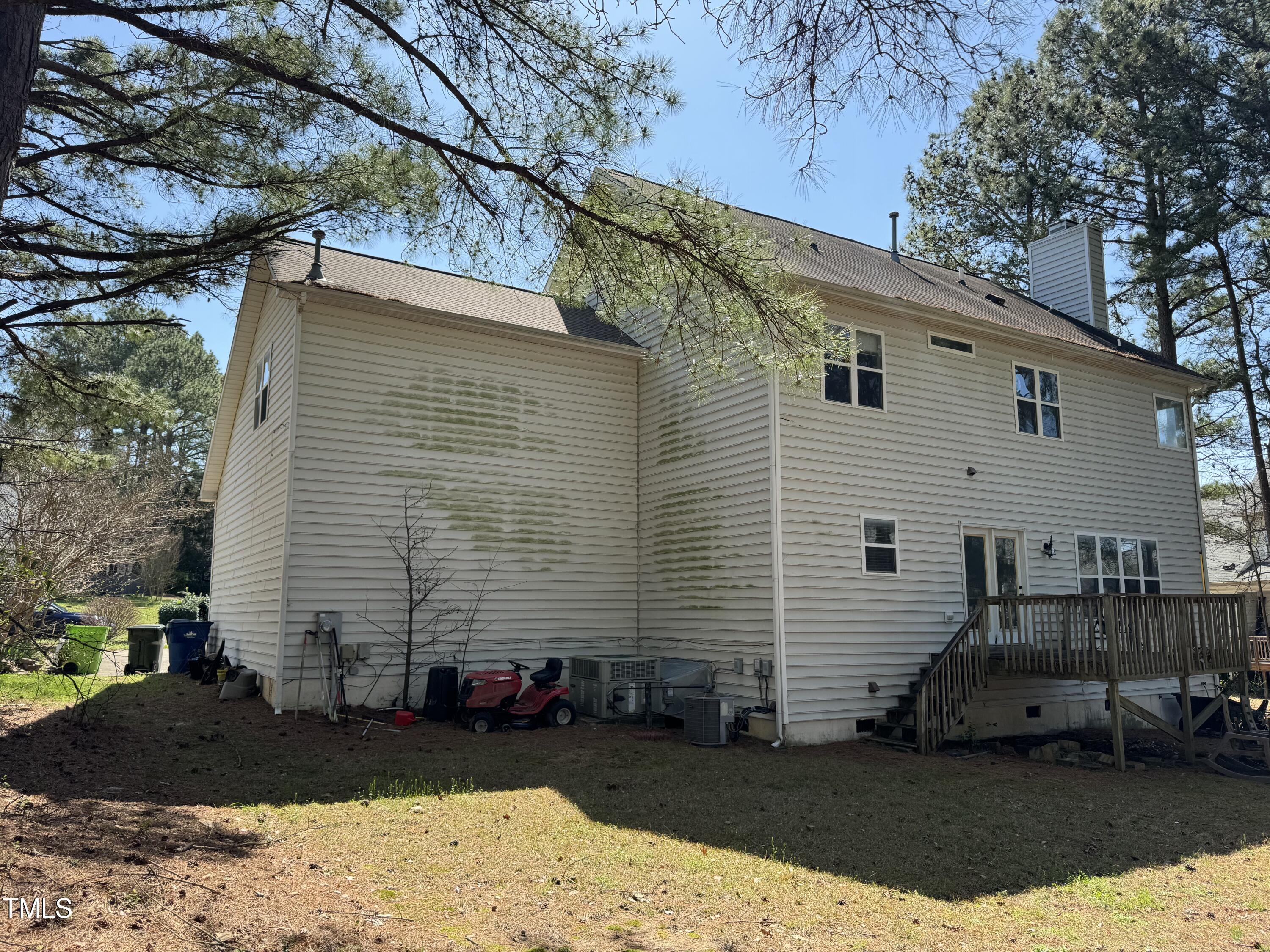 4809 Arbor Chase Drive Raleigh, NC 27616 - Photo 7 of 10 a front view of a house with a yard