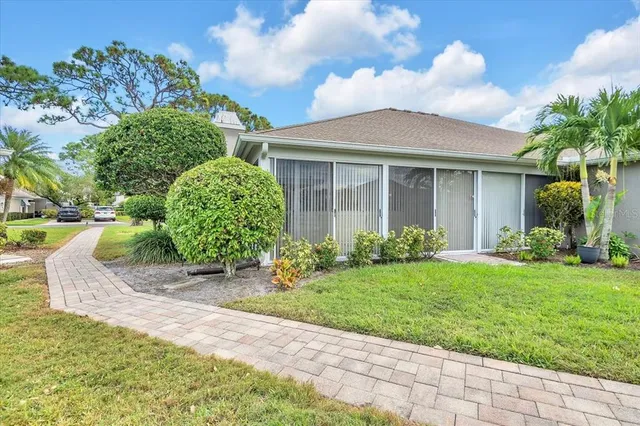 a view of a swimming pool with a garden