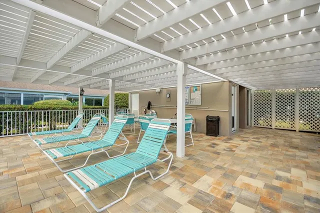 a view of a garden with a building in the background