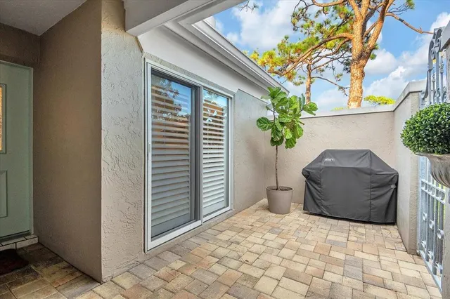 a view of a door and a window