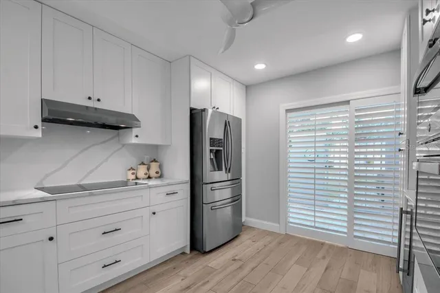 a view of kitchen and utility room