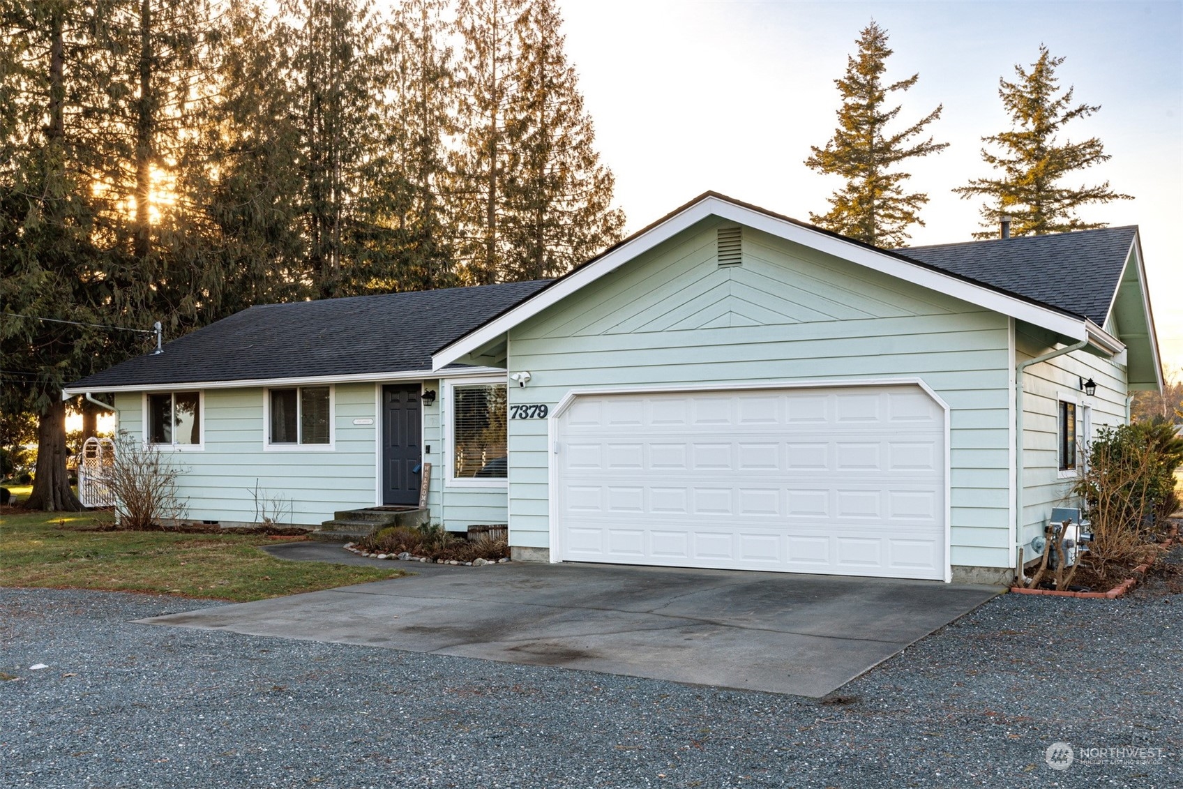 7379 Hannegan Road Lynden, WA 98264 - Photo 2 of 32 a view of a house with a yard