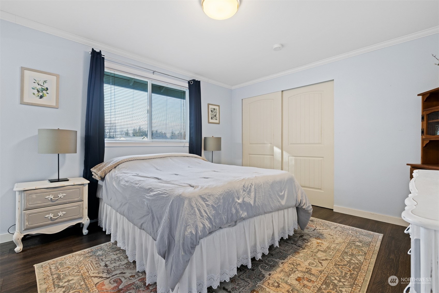 7379 Hannegan Road Lynden, WA 98264 - Photo 23 of 32 a bedroom with a bed and a window