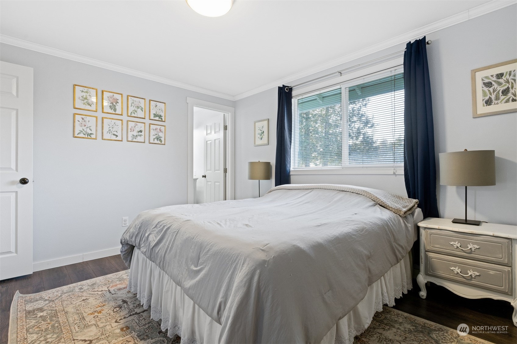 7379 Hannegan Road Lynden, WA 98264 - Photo 25 of 32 a bedroom with a bed and a window