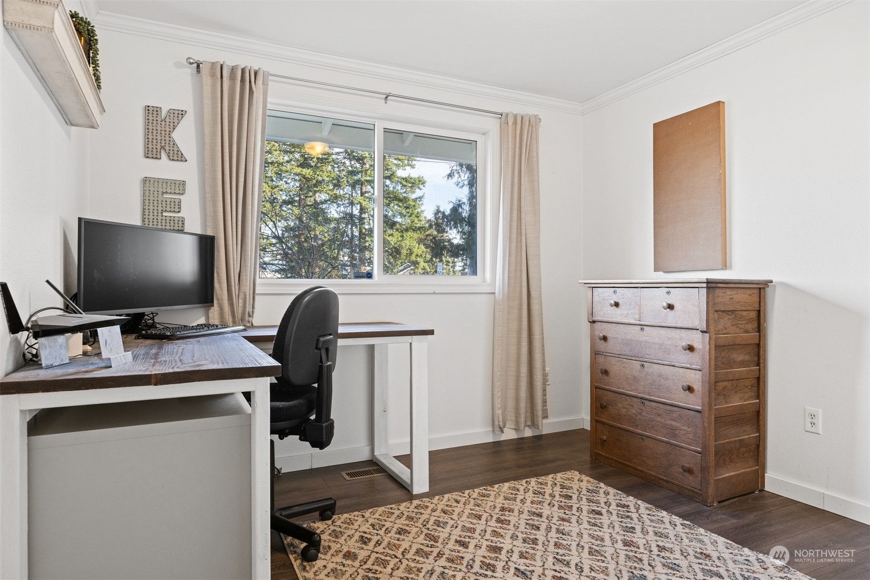 7379 Hannegan Road Lynden, WA 98264 - Photo 27 of 32 a view of a workspace with furniture and a window