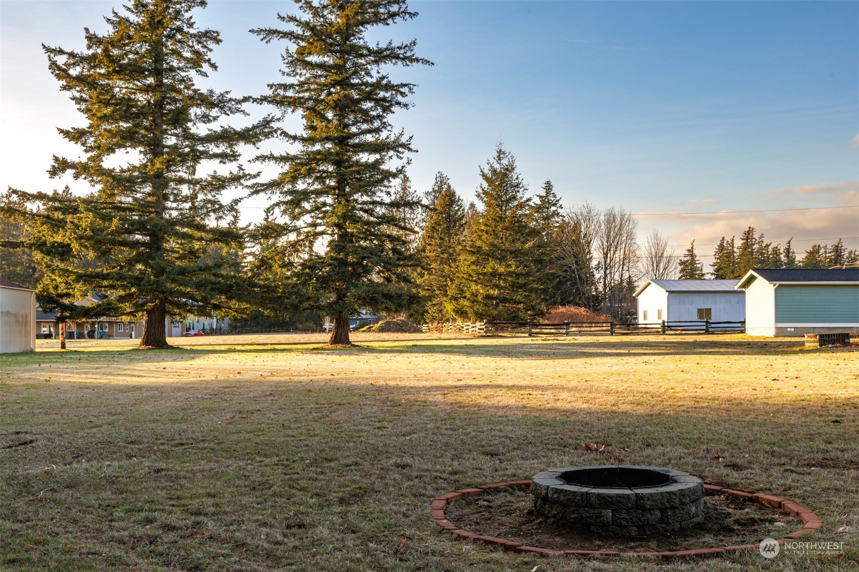 7379 Hannegan Road Lynden, WA 98264 - Photo 7 of 32 a view of an ocean and a yard