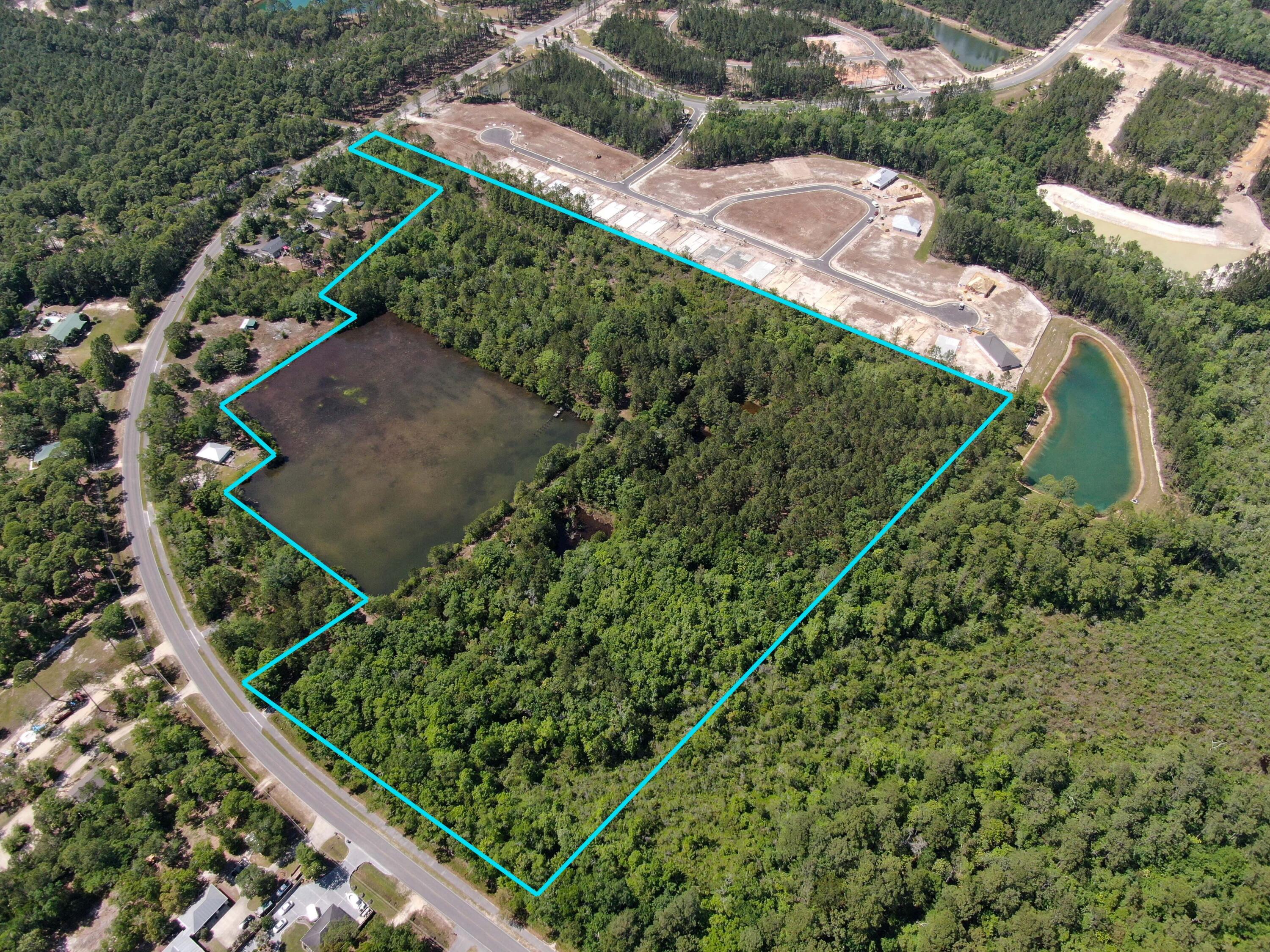 4279 County Highway 83A West Freeport, FL 32439 - Photo 3 of 10 an aerial view of a residential houses with outdoor space