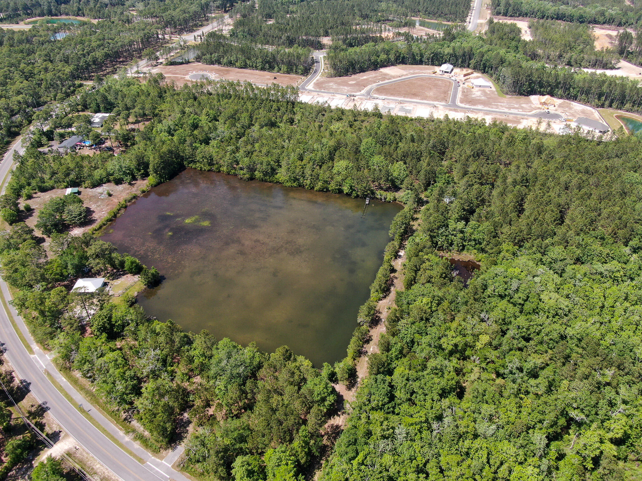 4279 County Highway 83A West Freeport, FL 32439 - Photo 5 of 10 a backyard of a house with a yard and outdoor seating