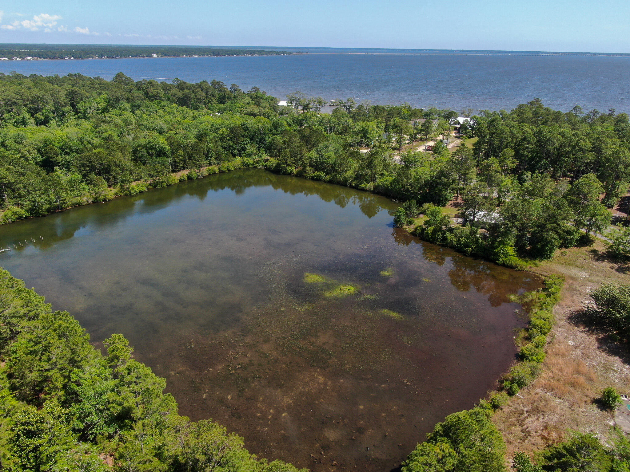 4279 County Highway 83A West Freeport, FL 32439 - Photo 7 of 10 an aerial view of a houses with a yard and lake view