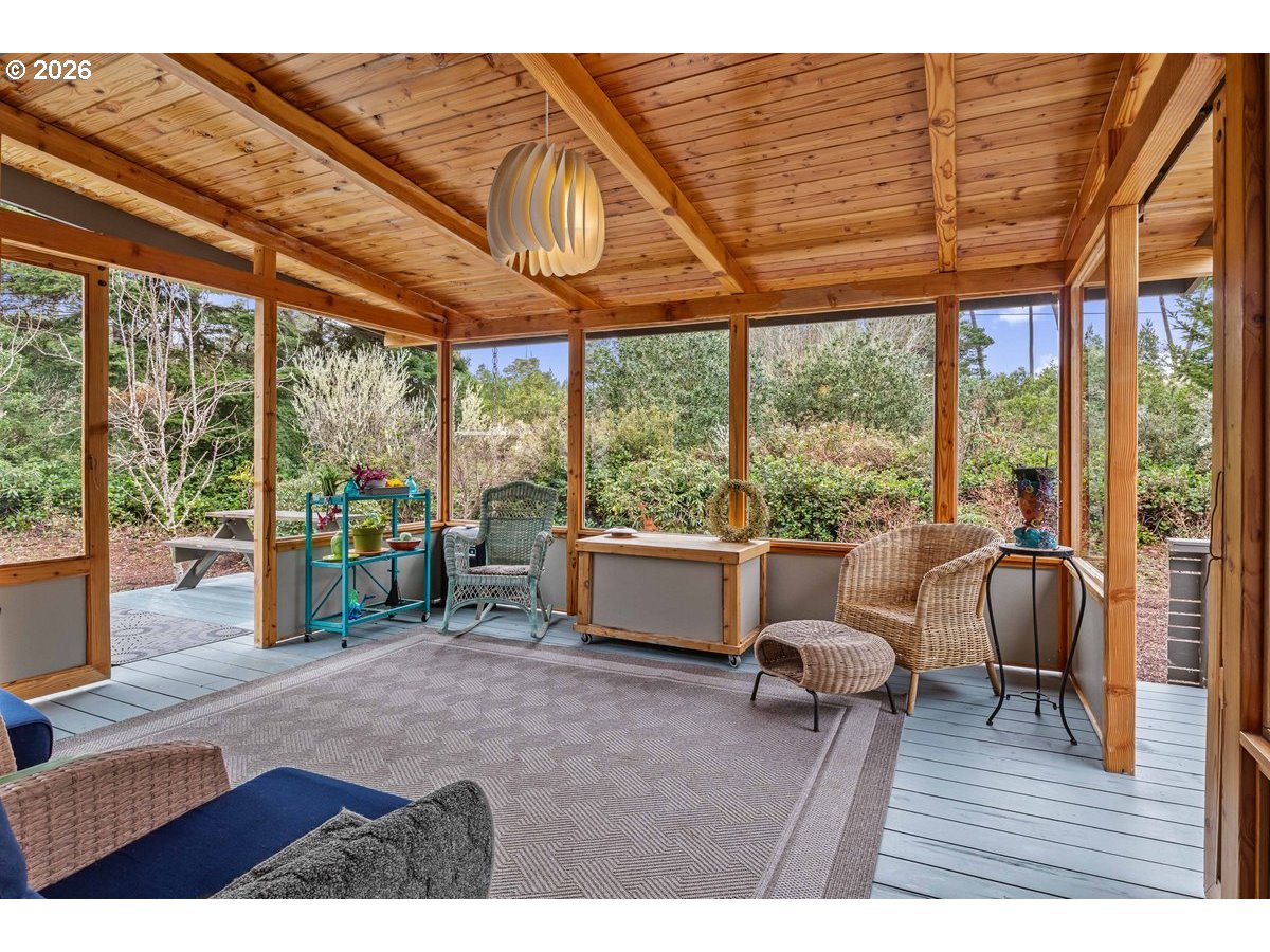 4975 Heceta Beach Road Florence, OR 97439 - Photo 17 of 48 a living room with furniture and a large window