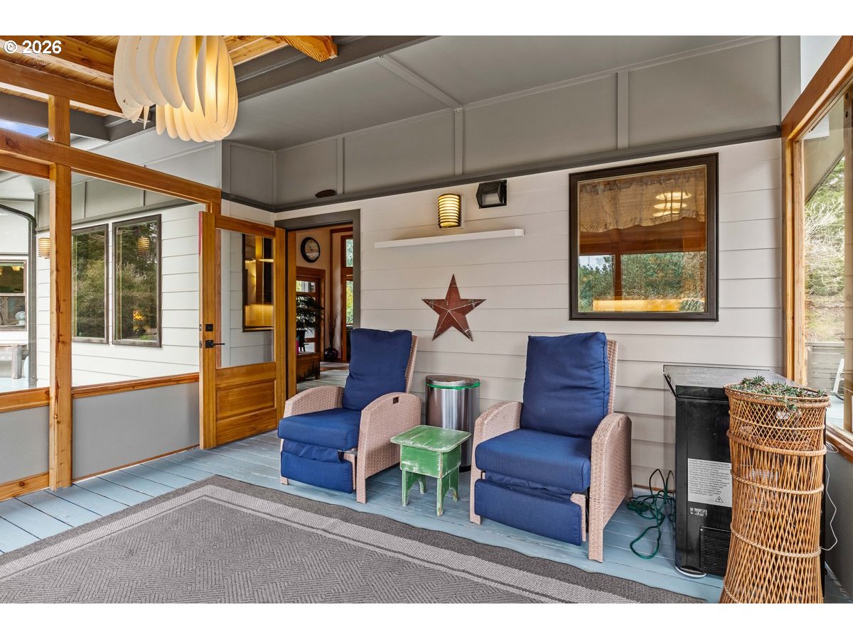 4975 Heceta Beach Road Florence, OR 97439 - Photo 19 of 48 a living room with furniture and a window