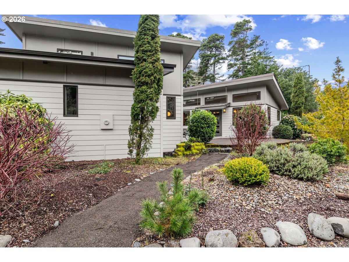 4975 Heceta Beach Road Florence, OR 97439 - Photo 37 of 48 a view of a house with a yard and plants