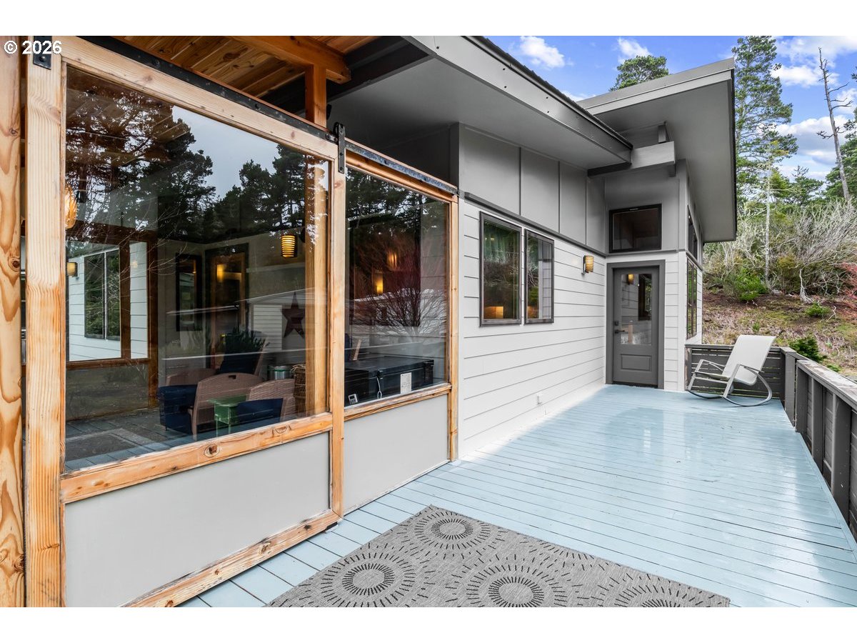 4975 Heceta Beach Road Florence, OR 97439 - Photo 41 of 48 a view of a building from a balcony