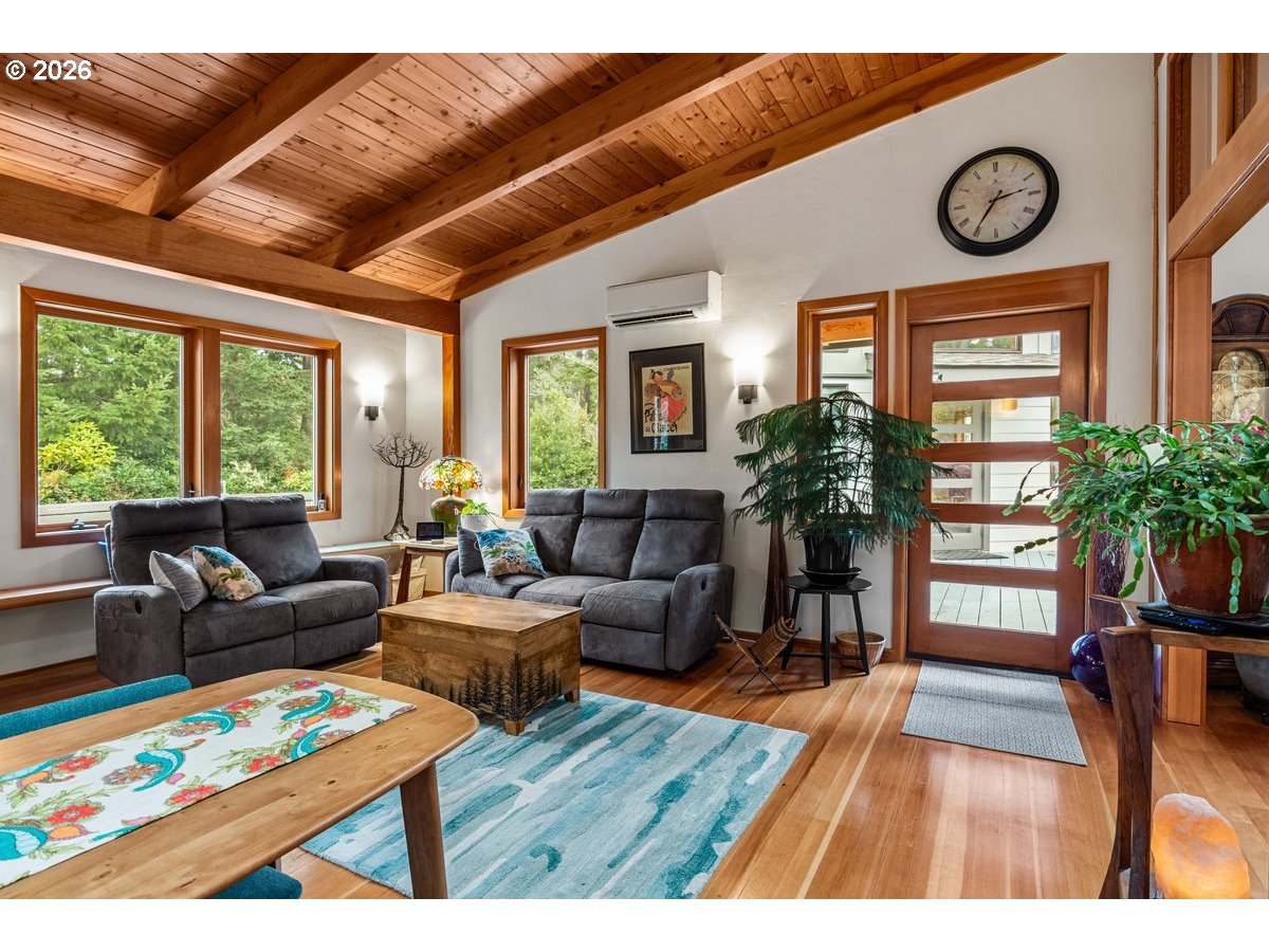 4975 Heceta Beach Road Florence, OR 97439 - Photo 7 of 48 a living room with furniture and a large window