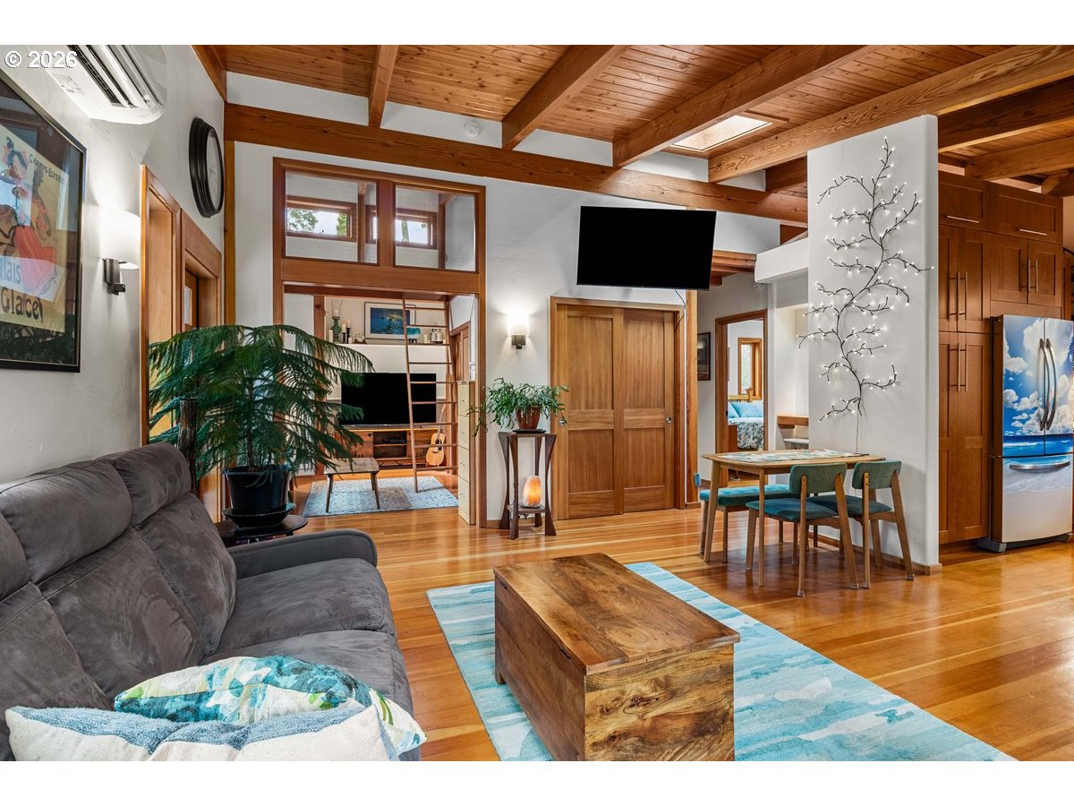 4975 Heceta Beach Road Florence, OR 97439 - Photo 8 of 48 a living room with furniture and a flat screen tv
