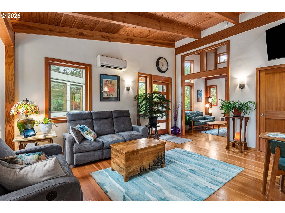 4975 Heceta Beach Road Florence, OR 97439 - Photo 9 of 48 a living room with furniture and a large window