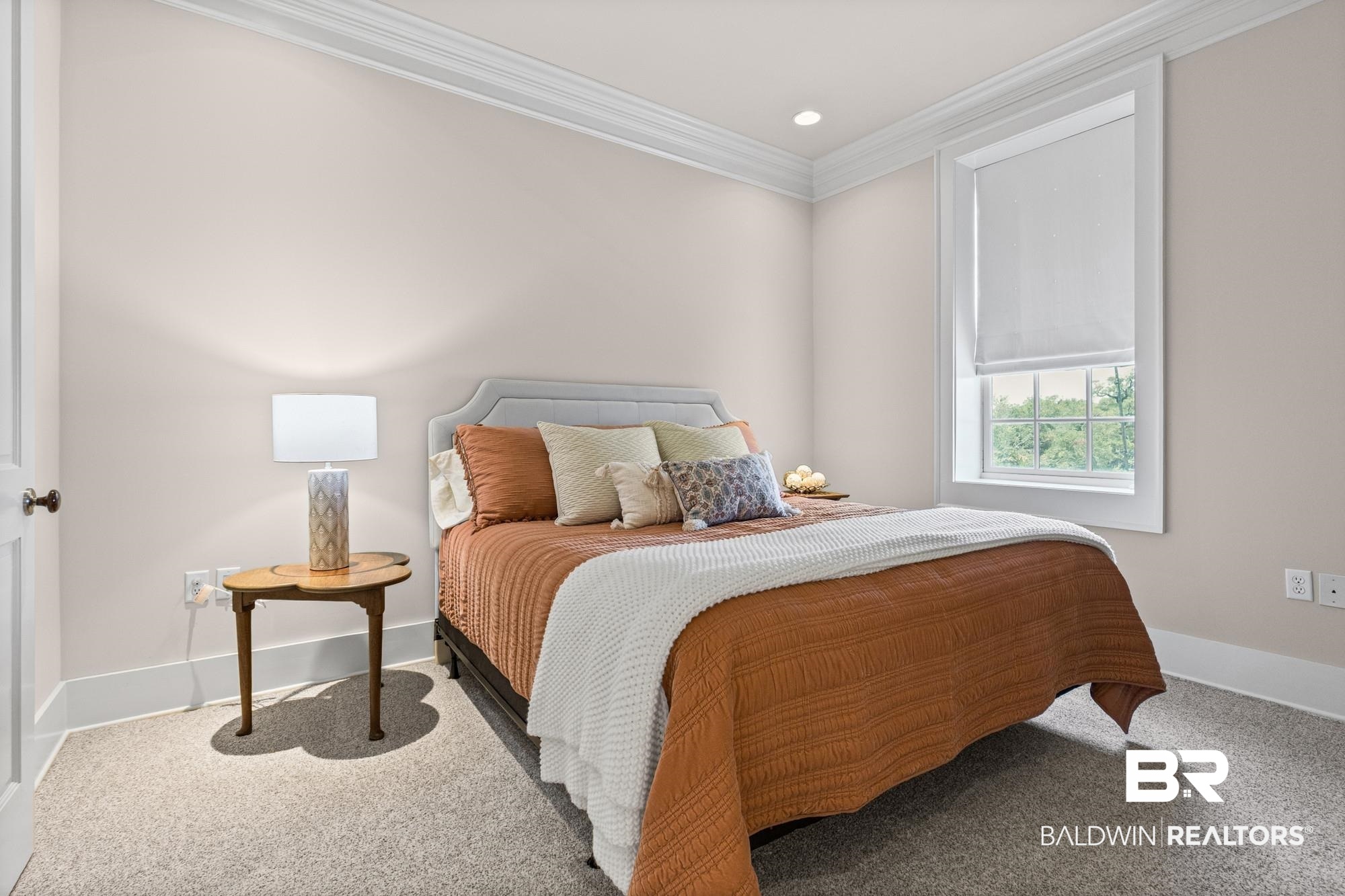 701 Dauphin Street, Unit A Mobile, AL 36602 - Photo 18 of 31 Carpeted room featuring a single window with white trim, crown molding, and recessed lighting
