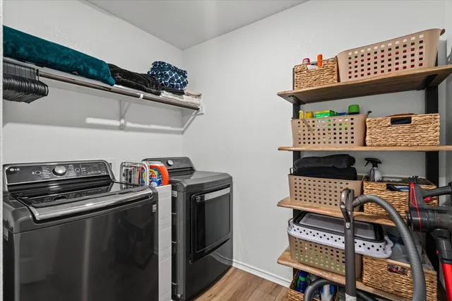 a room with furniture a rug and a window