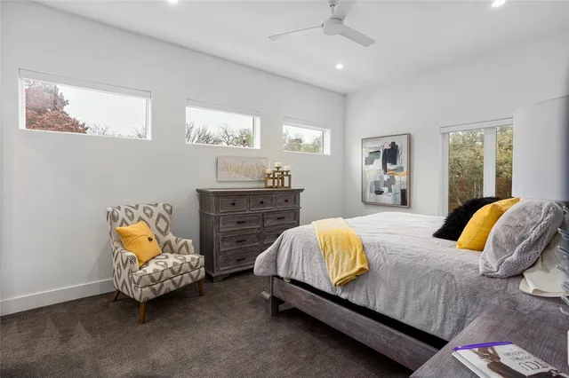 a bedroom with bed and window
