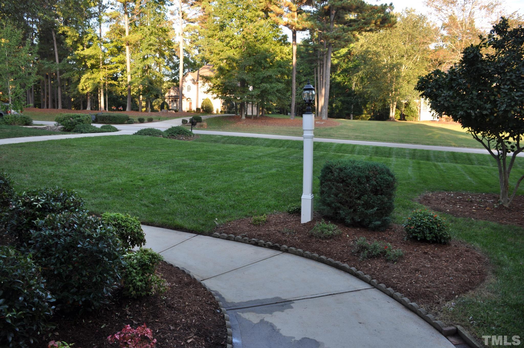 6617 Swallowtail Lane Raleigh, NC 27613 - Photo 3 of 30 a view of a park with tree s