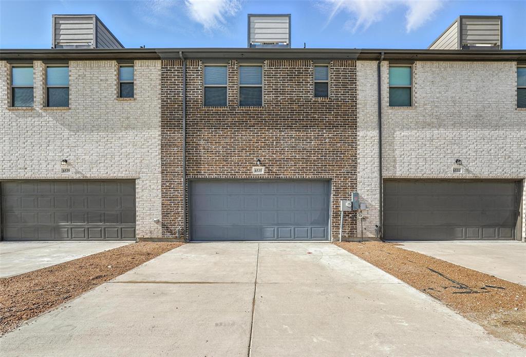 6535 Baritone Court Sachse, TX 75048 - Photo 18 of 24 a front view of a house with yard