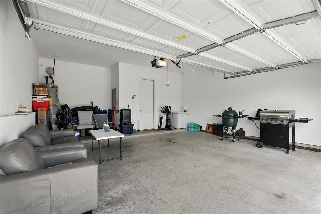 6535 Baritone Court Sachse, TX 75048 - Photo 19 of 24 a living room with furniture and a gym machine