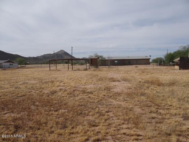 7789 West McCartney Road, Unit 4 Casa Grande, AZ 85194 - Photo 1 of 11 a view of an ocean beach and a mountain