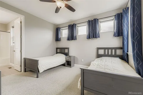 a living room with furniture and flat screen tv