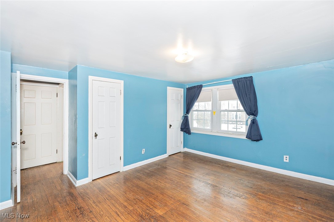 3719 Berkeley Road Cleveland Heights, OH 44118 - Photo 31 of 44 Unfurnished bedroom with dark wood finished floors and a closet
