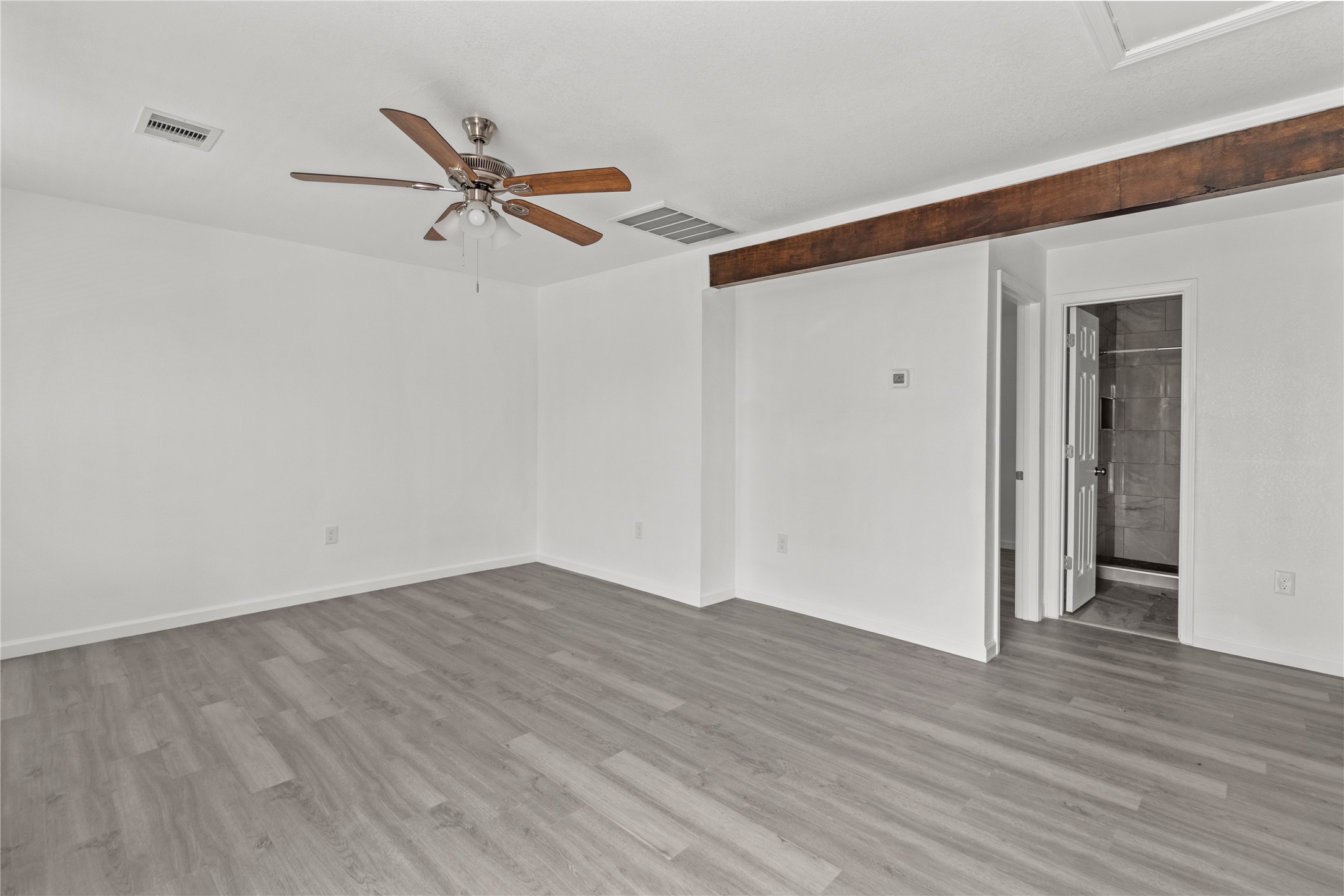 316 20th Street, Unit B San Leon, TX 77539 - Photo 2 of 11 wooden floor in an empty room