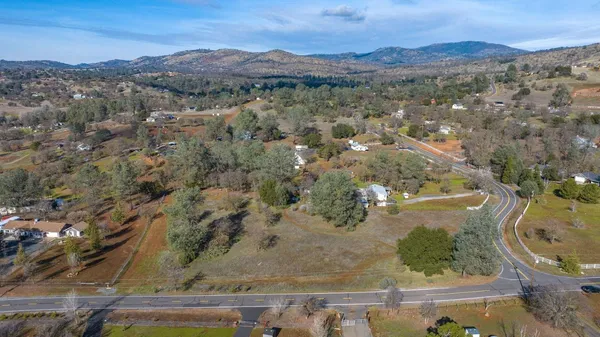 an aerial view of mountain with an outdoor space