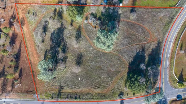 a view of a city with mountains in the background