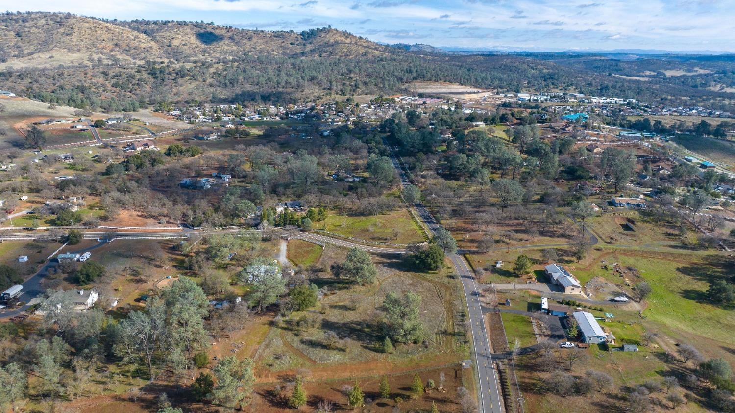 790 Pinon Drive Copperopolis, CA 95228 - Photo 9 of 25 a view of a city with mountains in the background