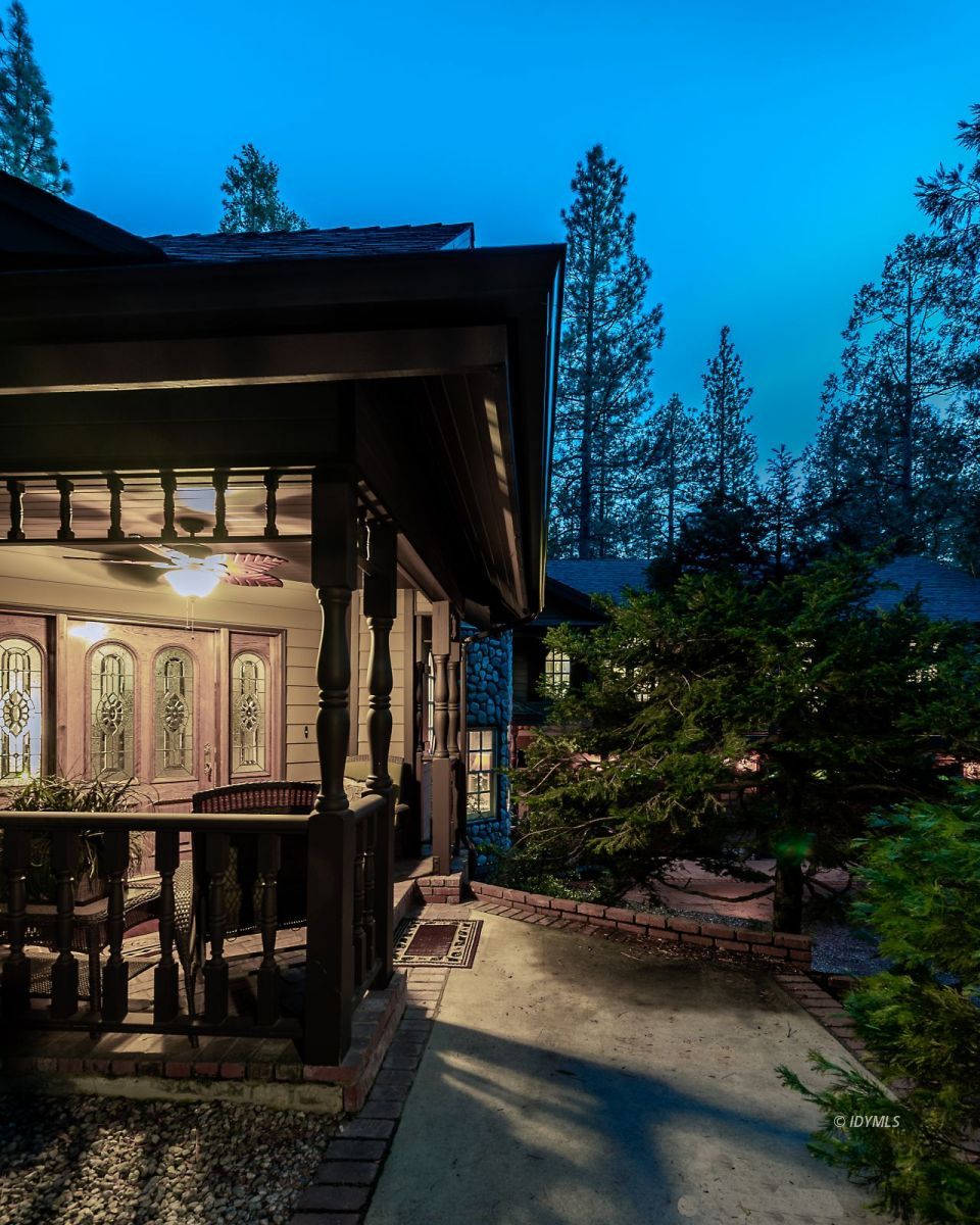 52595 Idyllmont Road Idyllwild, CA 92549 - Photo 19 of 58 a view of a house with large windows