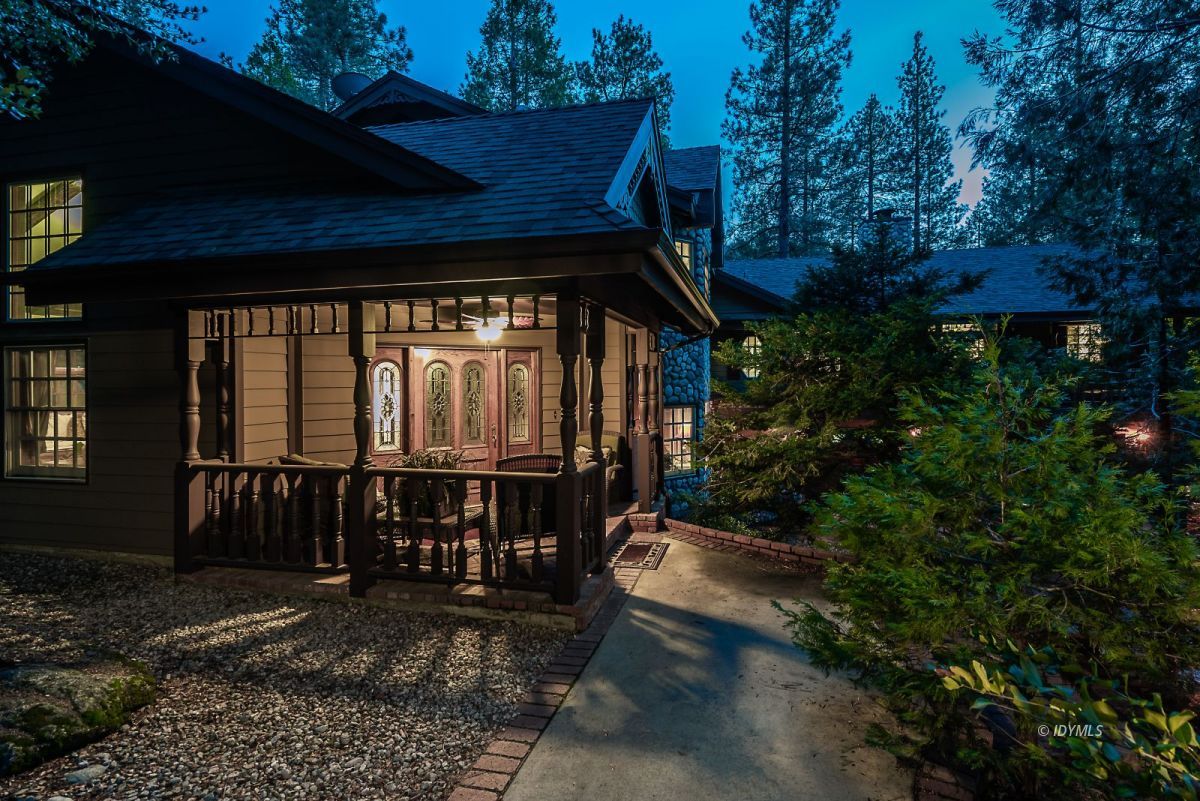 52595 Idyllmont Road Idyllwild, CA 92549 - Photo 20 of 58 a view of a porch with furniture and backyard