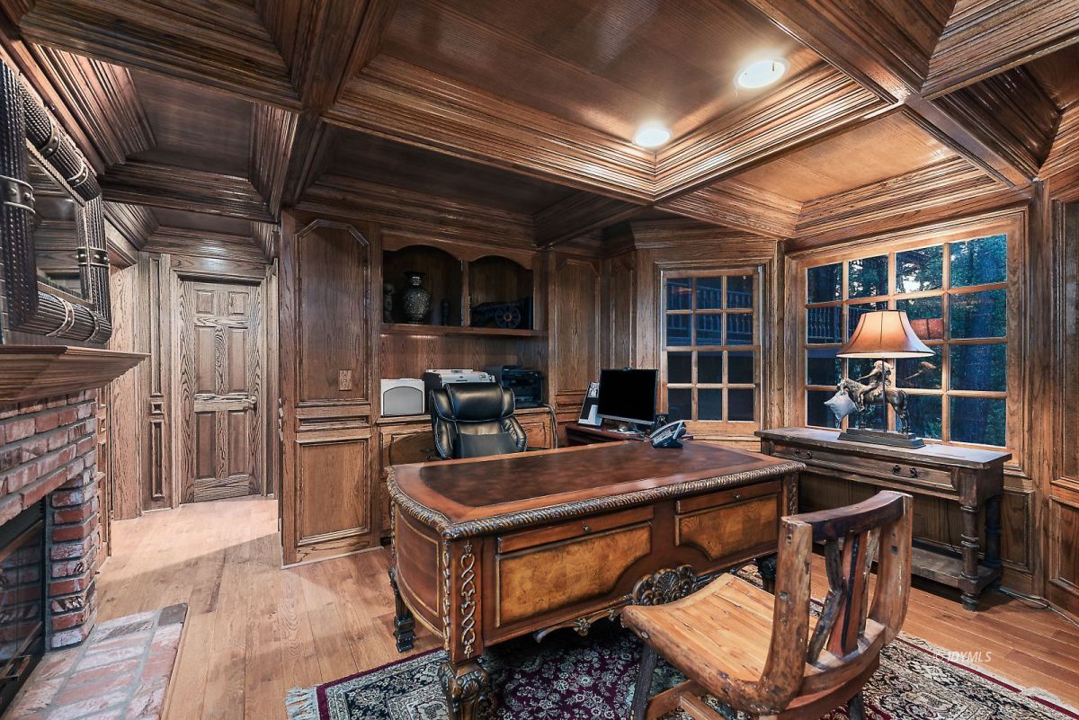 52595 Idyllmont Road Idyllwild, CA 92549 - Photo 24 of 58 a room with table chairs and a fireplace