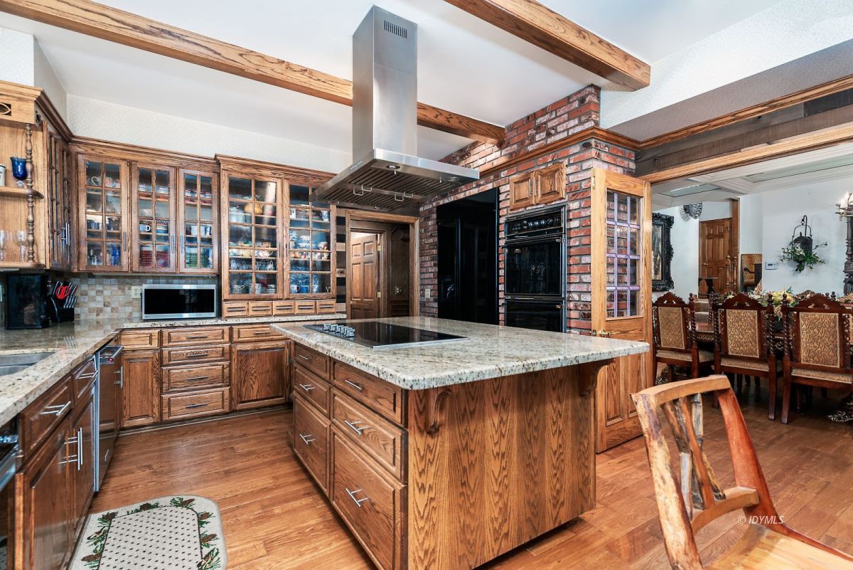 52595 Idyllmont Road Idyllwild, CA 92549 - Photo 30 of 58 a kitchen with stainless steel appliances granite countertop lots of counter top space