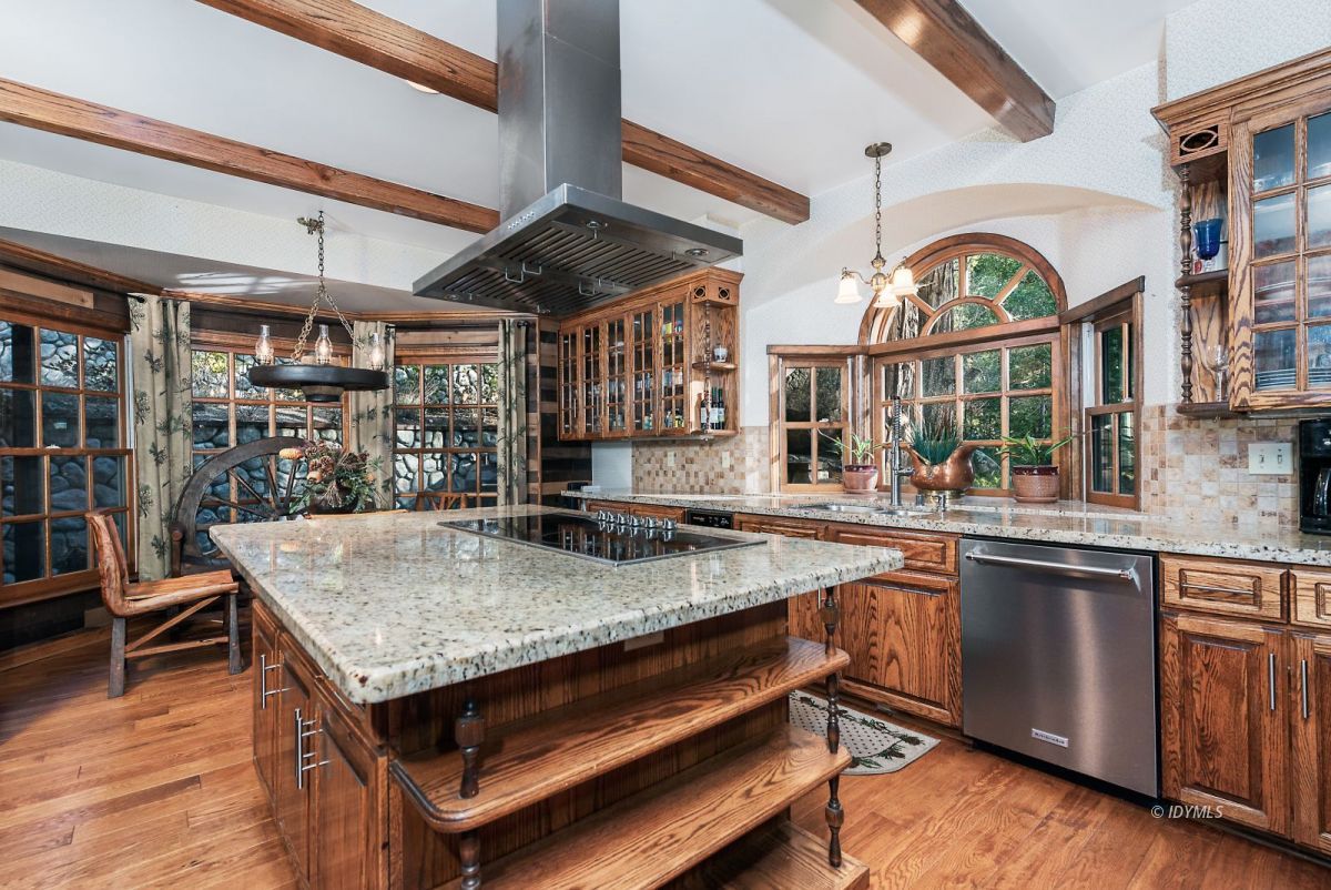 52595 Idyllmont Road Idyllwild, CA 92549 - Photo 31 of 58 a kitchen with lots of counter top space and a window