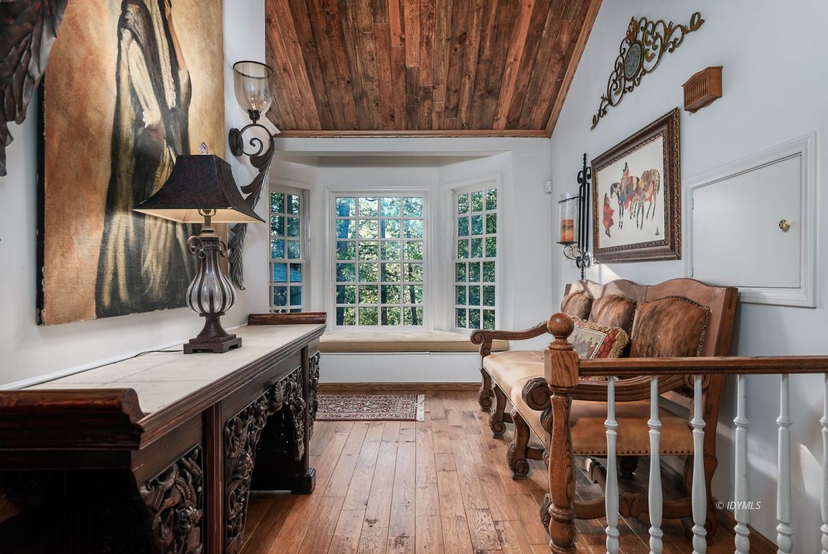 52595 Idyllmont Road Idyllwild, CA 92549 - Photo 38 of 58 a living room with furniture and a large window