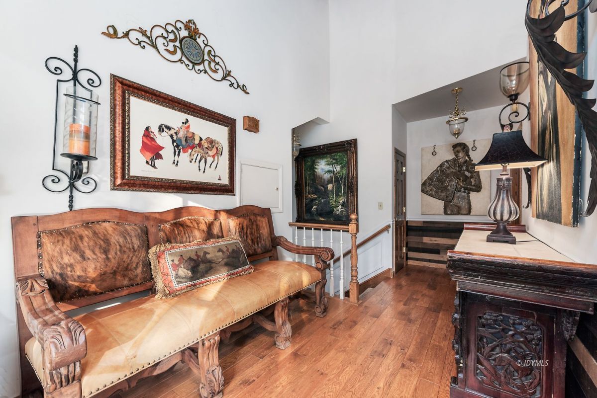 52595 Idyllmont Road Idyllwild, CA 92549 - Photo 39 of 58 a living room with furniture and a wooden floor
