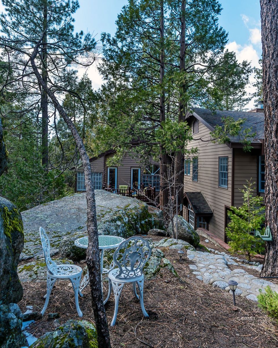 52595 Idyllmont Road Idyllwild, CA 92549 - Photo 58 of 58 a view of a house with a yard and large tree