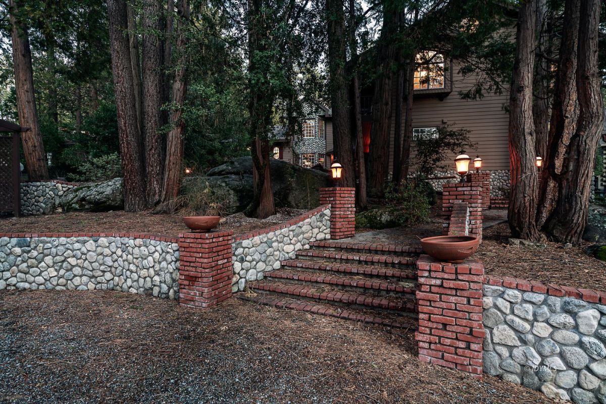 52595 Idyllmont Road Idyllwild, CA 92549 - Photo 7 of 58 a view of a bench in a yard