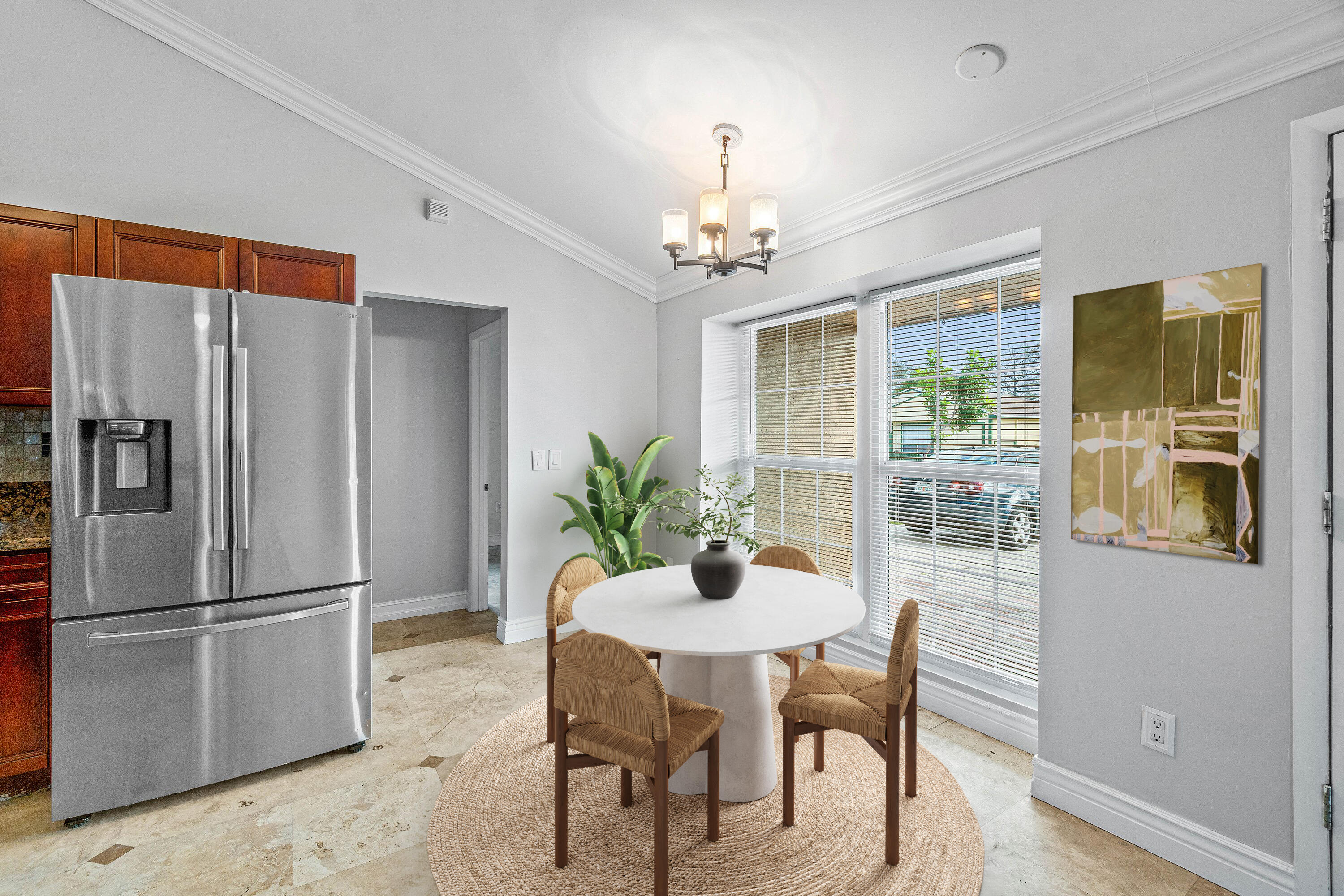 8411 Garden Gate Place Boca Raton, FL 33433 - Photo 4 of 12 a view of a dining room with furniture window and wooden floor