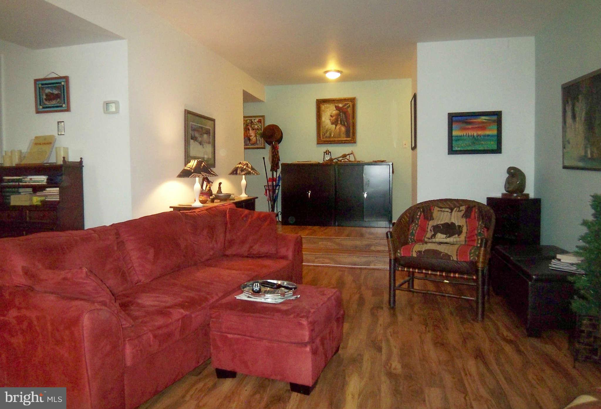 1621 Parkcrest Circle, Unit 101 Reston, VA 20190 - Photo 3 of 13 Spacious Living Room to enjoy cozy evenings