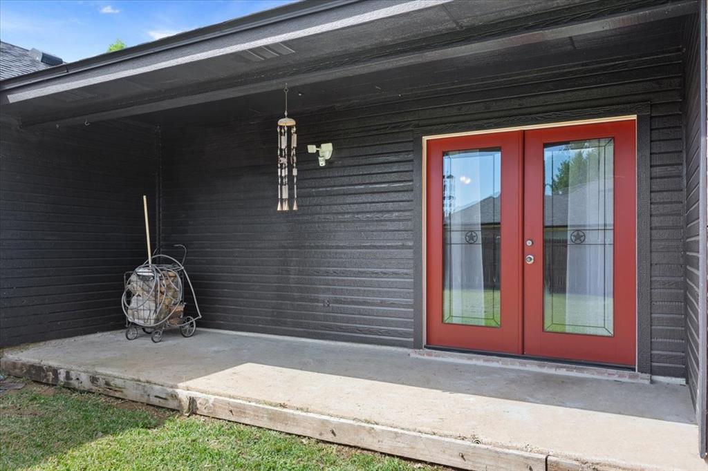 10817 Lilry Road Waco, TX 76708 - Photo 23 of 27 Doorway to property featuring french doors and a porch