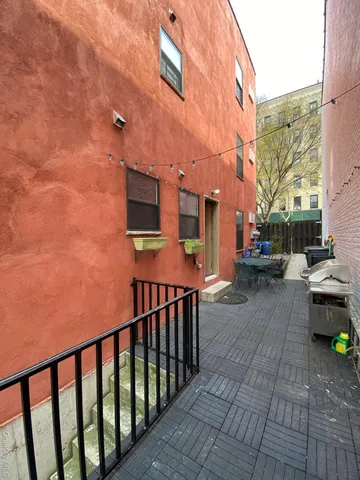 a city street lined with parked cars