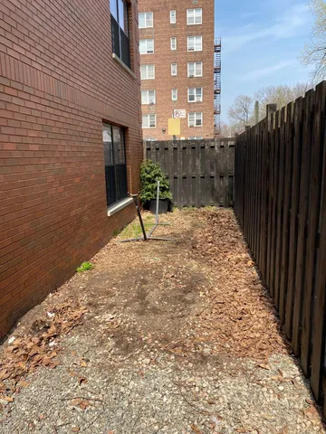 a backyard of a house with a yard
