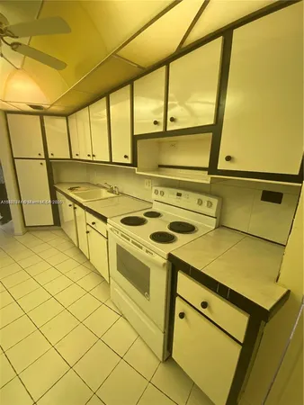 an empty room with a empty space and a ceiling fan