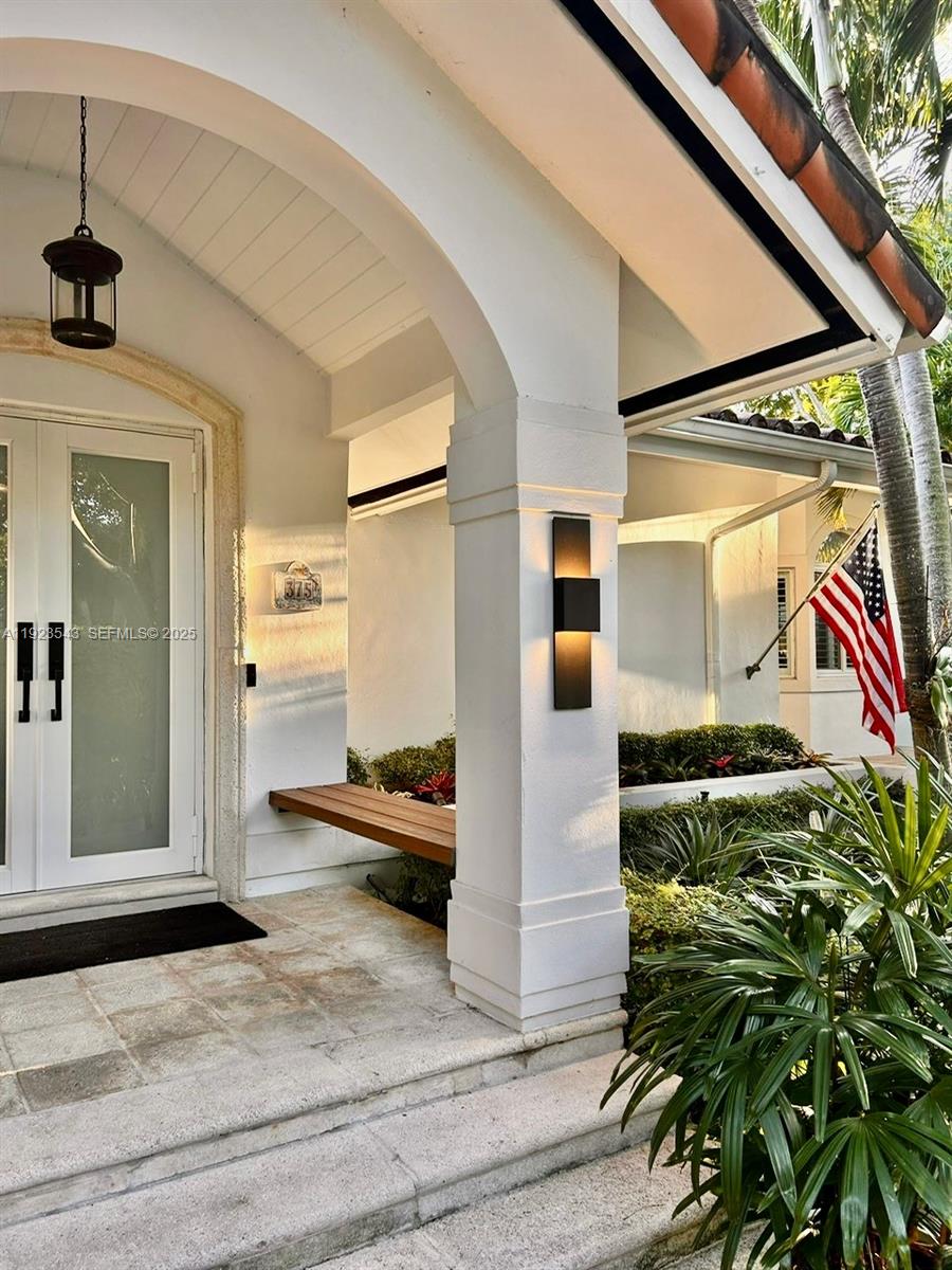 375 Harbor Court Key Biscayne, FL 33149 - Photo 11 of 58 a front view of a house with a outdoor space